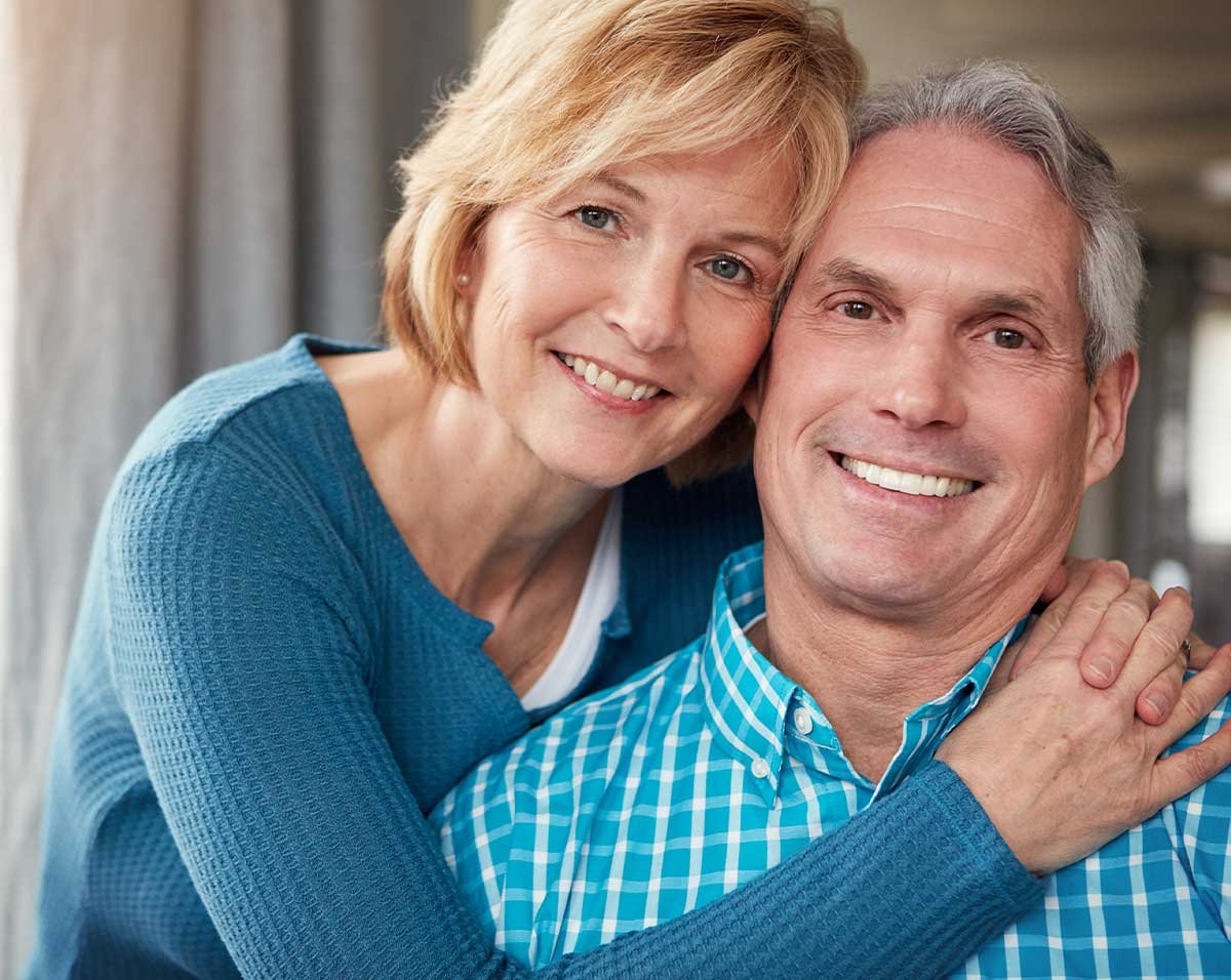 Smiling older couple outdoors